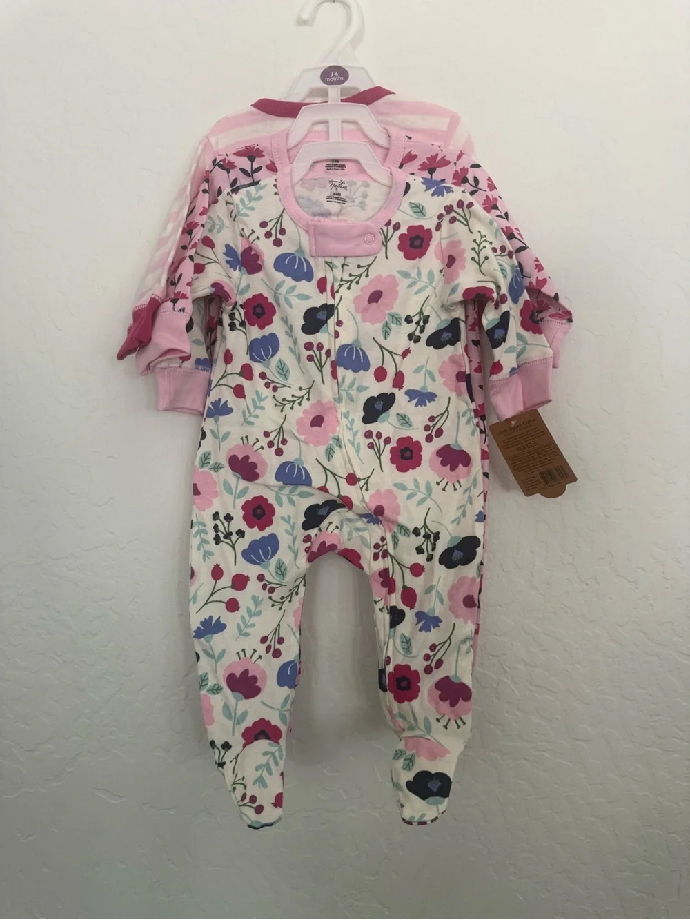 Brand new 3 pack of Pink Floral Baby One-Piece Footed Pajamas